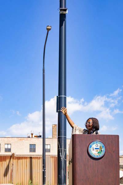 Woman speaking at a podium in Chicago